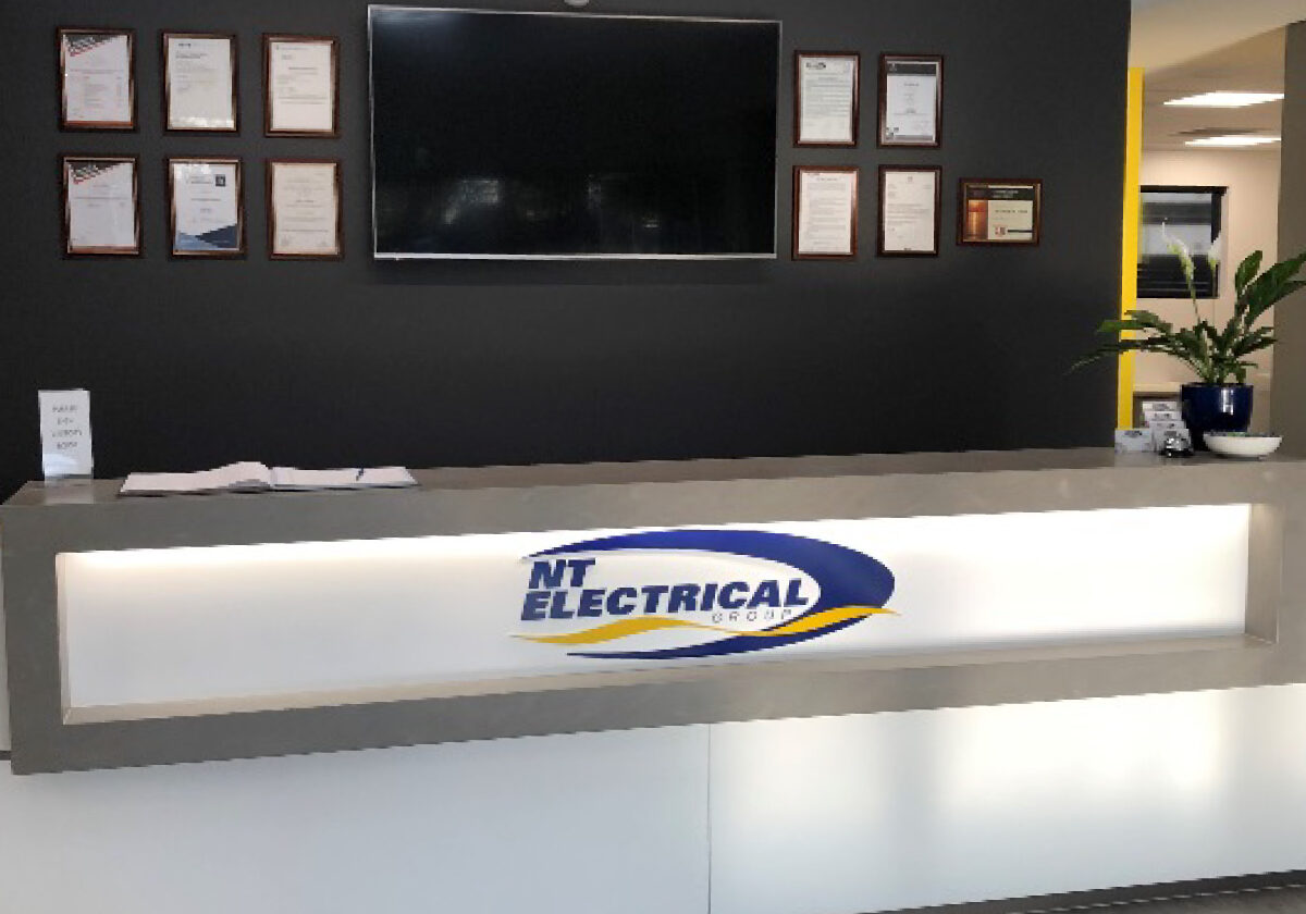 Northern Territory Electrical Group - Front reception area with desk and awards.