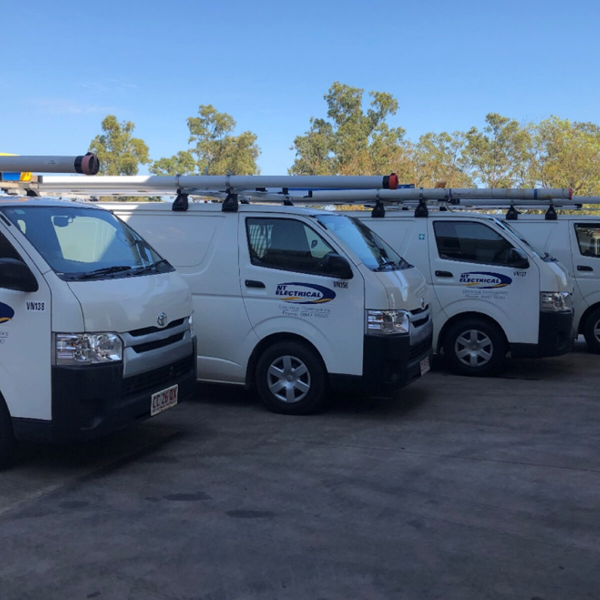 Northern Territory Electrical Group - Electrical Technician vans parked side by side.